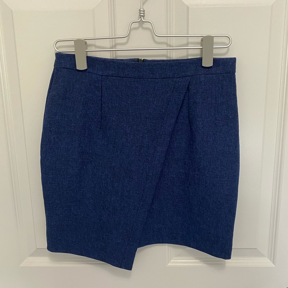 Blue asymmetric mini skirt.
